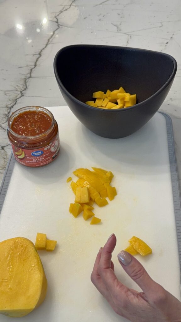 Adding fresh mango to store bought salsa