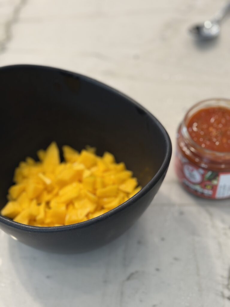 Adding fresh mango to store bought salsa
