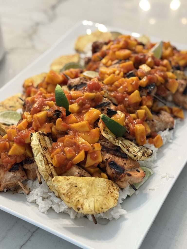 crack On Chicken Skewers over coconut rice and mango salsa