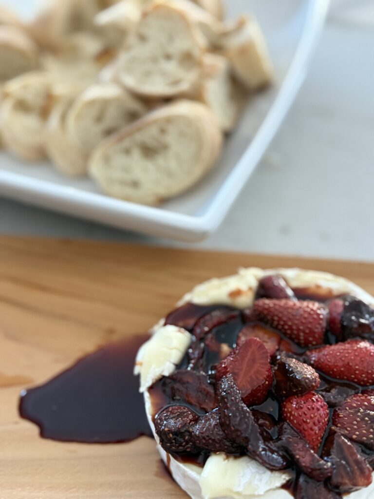 cedar planked brie with strawberry balsamic glaze