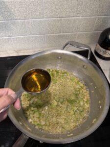 Add brandy or white wine