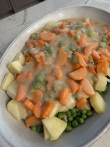 pour gravy over pot pie ingredients